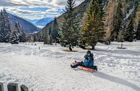 Winterzauber: Rodeln bei Tag und Nacht