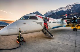 Wie der Flughafen Innsbruck das Fliegen in den Bergen und im Schnee sicher macht